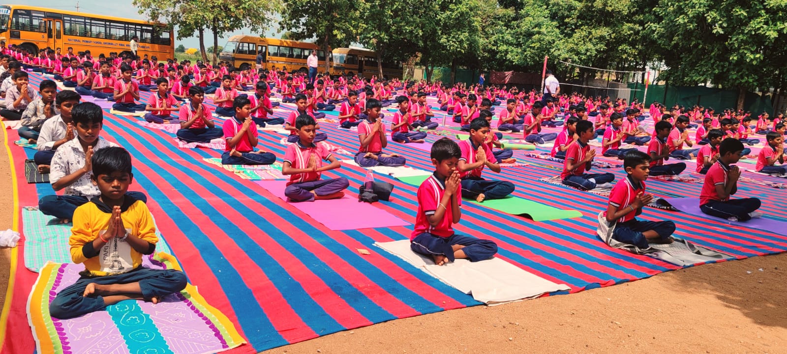 Students practicing yoga